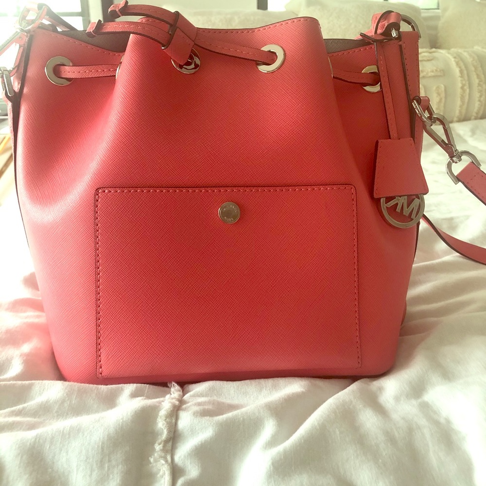 Like new! Michael Kors bucket bag in coral